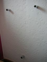 mountings fixed to wall