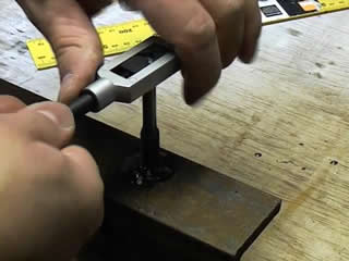using a tap wrench