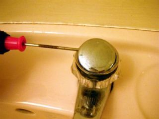 remove tap cover